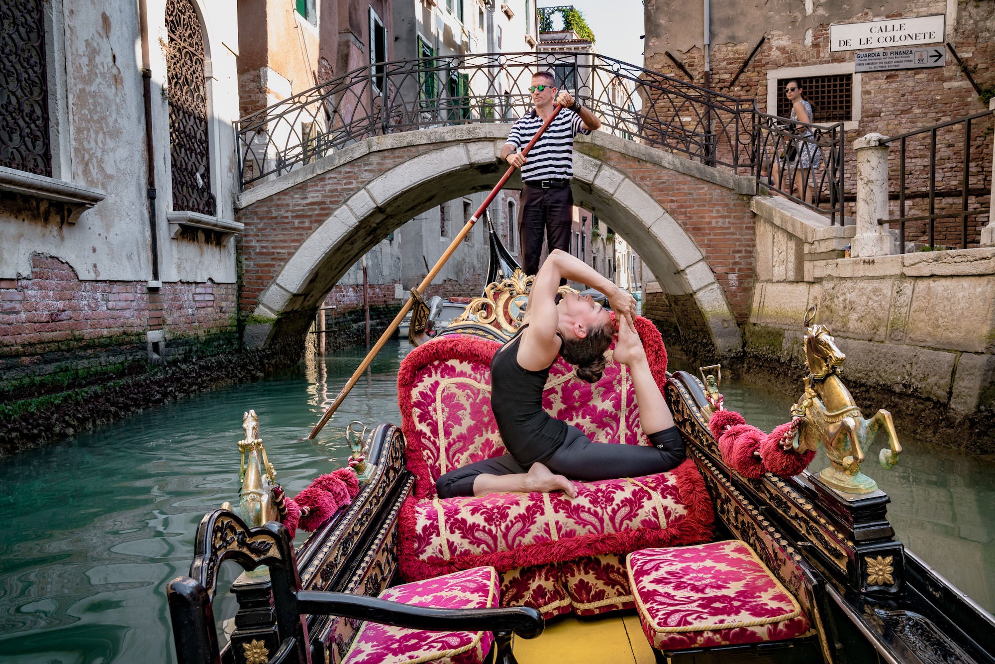 Woman doing yoga pose in Venice, Italy